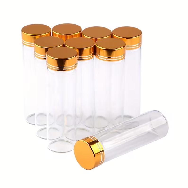 Bouteille en verre transparente de luxe avec bouchon doré 11×3,5 cm